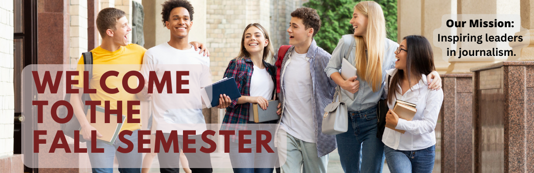 Six college students smiling and standing very close together