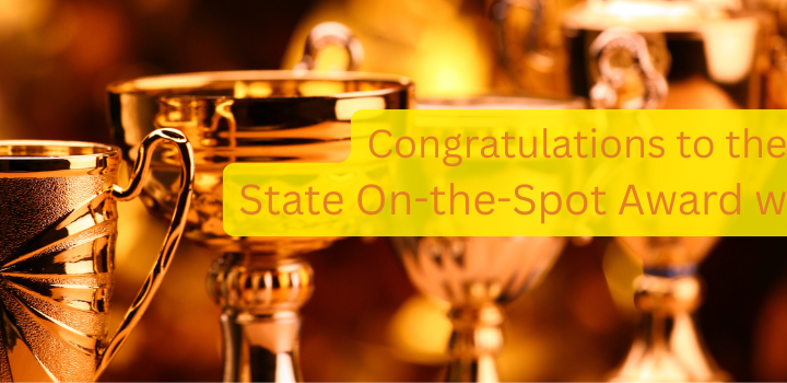 Several trophy cups lined up with the words, "congratulations to the state on the spot award winners"