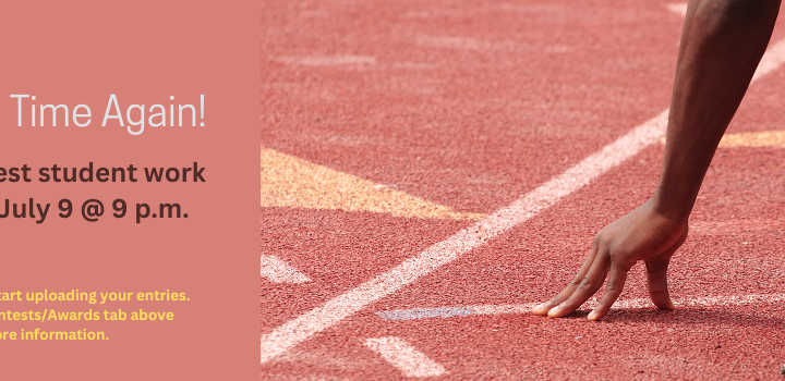 Legs and hands of man kneeling at starting line of track race